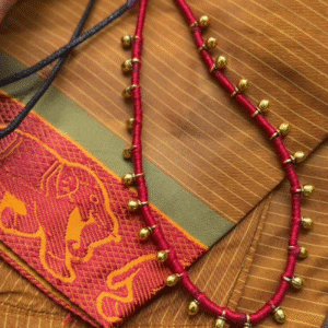 Handmade ghungroo gap necklace on a red and black adjustable thread