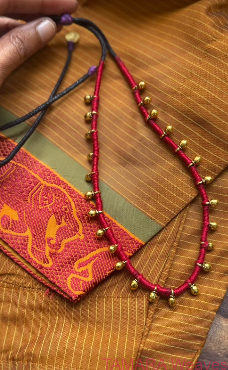 Handmade ghungroo gap necklace on a red and black adjustable thread