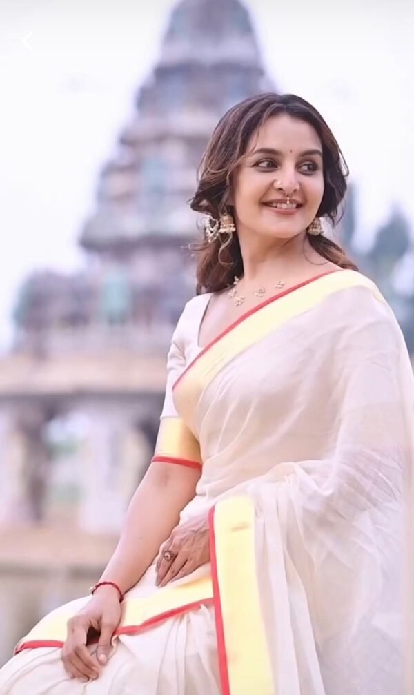 Manju Warrier inspired kasavu and red kara mul cotton saree