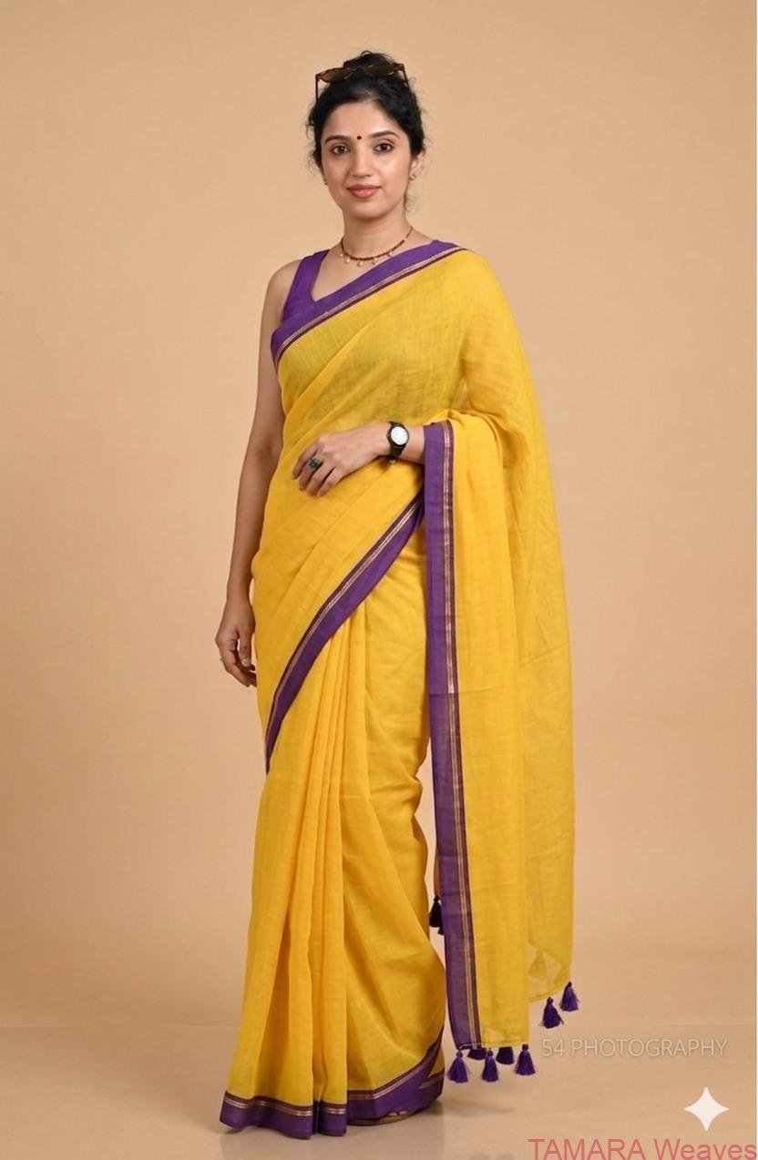 Yellow mul cotton saree with violet zari line borderin Australia