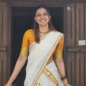 Dark red kara and gold kasavu set mundu in Australia - Actor Anusree inspired