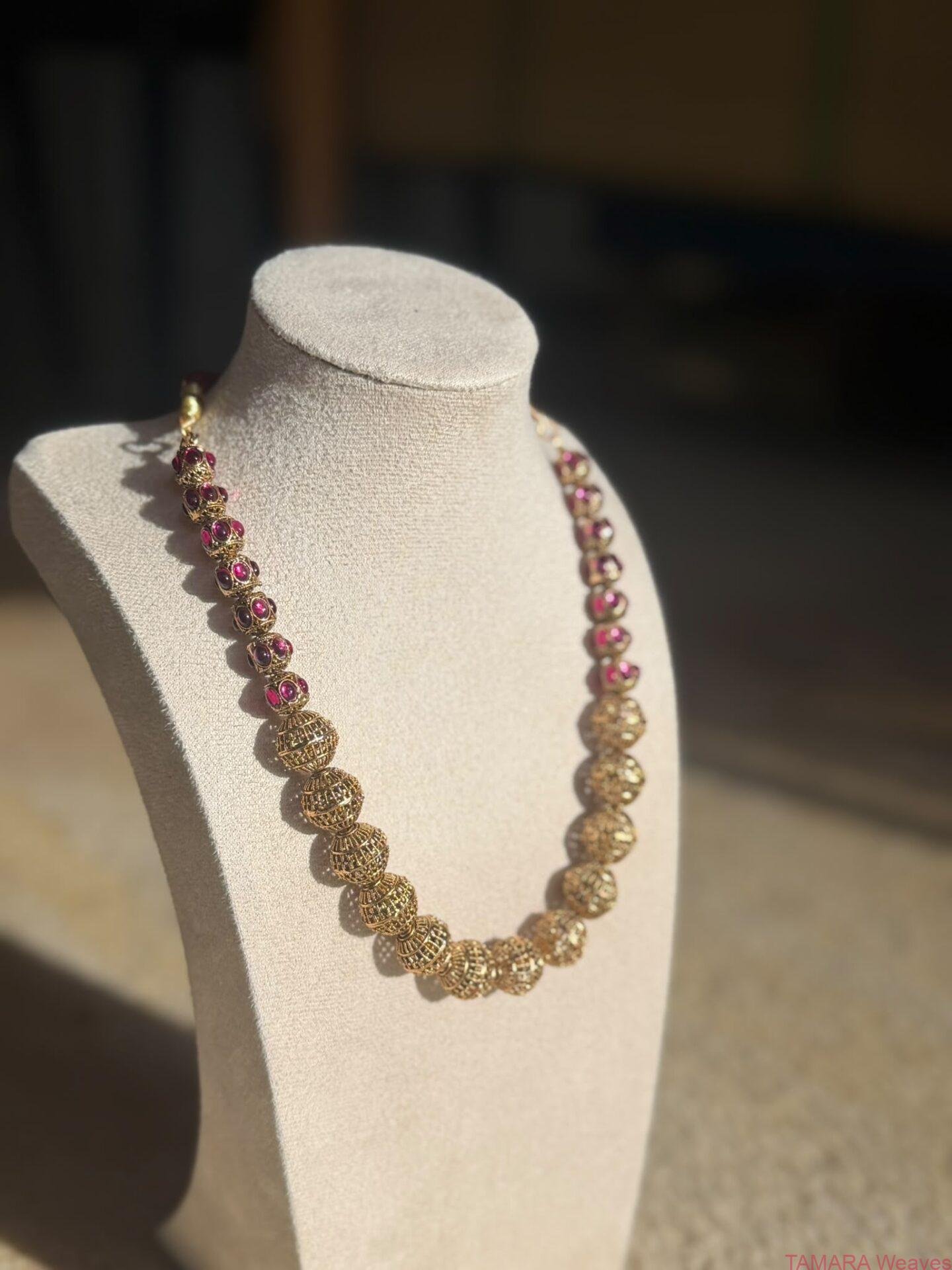 Antique gold lookalike balls short necklace with stones